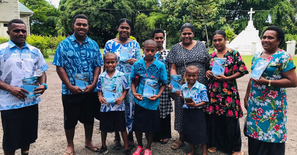 A group of people holding The Word for Today A group of people holding The Word for Today